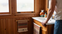 A Basically All-Wood Paneled '70s Bathroom Got an Americana Folk Makeover