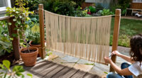 Skip Traditional Fences: Add Privacy To Your Yard With This Boho-Inspired Idea